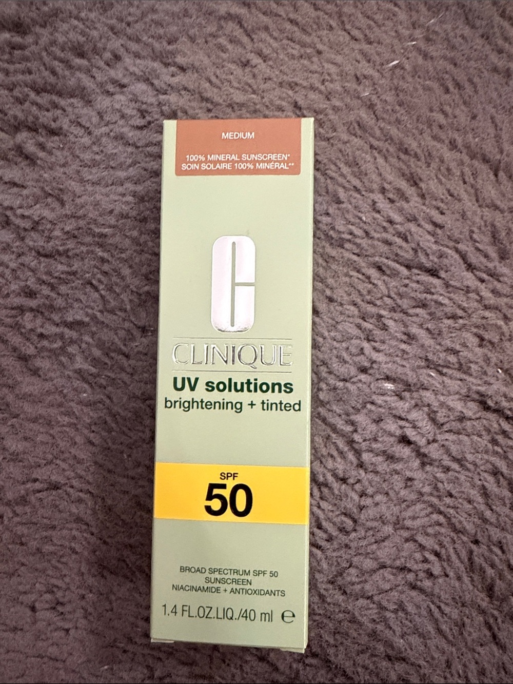 Clinique UV Solutions Brightening + Tinted SPF 50 in Green and Yellow